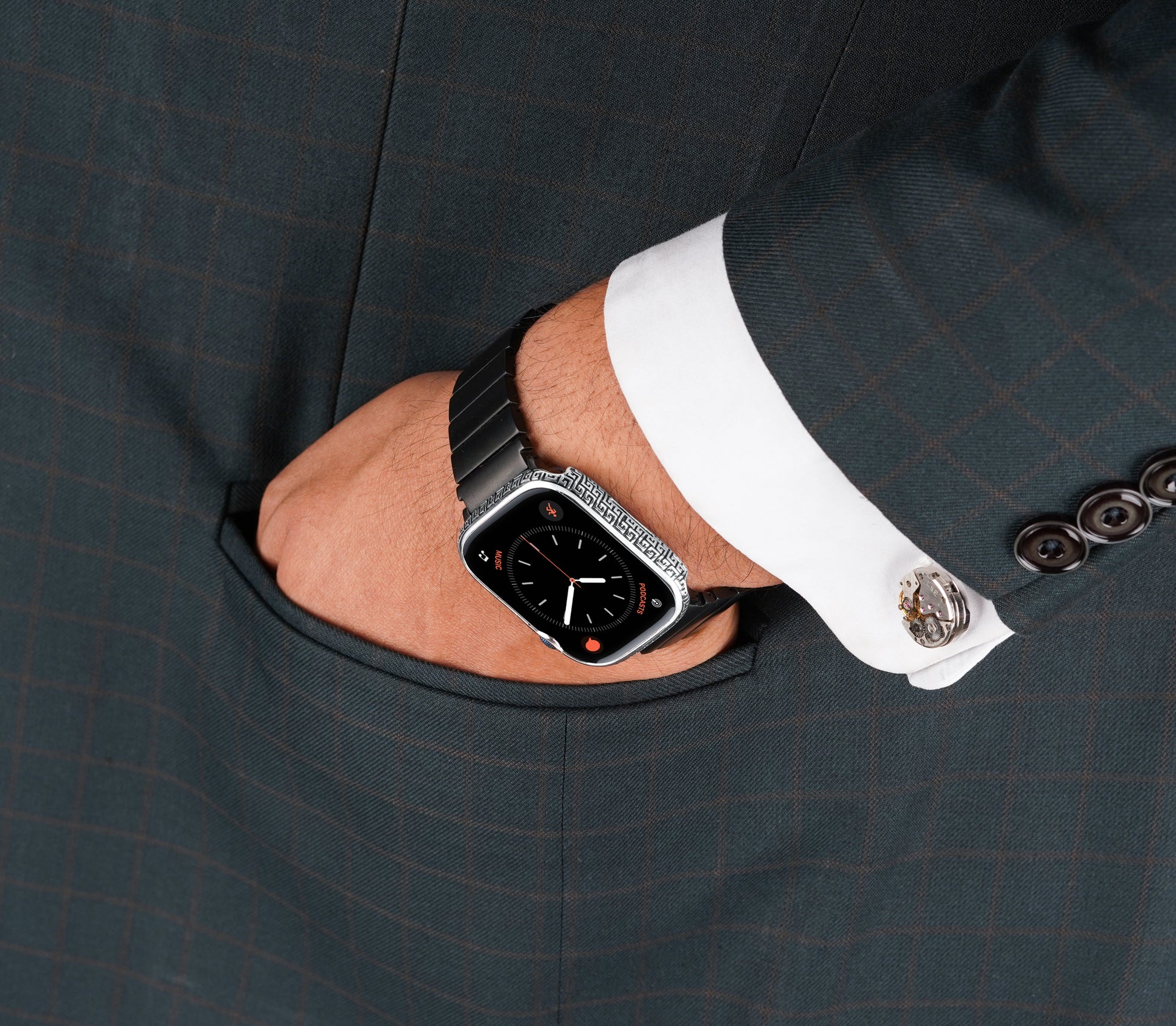 Apple Watch Series 9 silver case with custom design made from sterling silver with a PVD-coated silver finish, featuring hand-applied black enamel for a sleek and sophisticated design