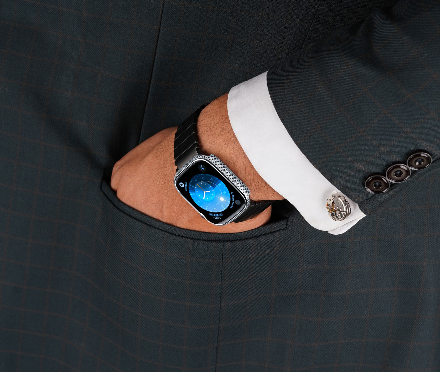 Apple Watch Series 9 silver case with custom design made from sterling silver with a PVD-coated silver finish, featuring hand-applied black enamel for a sleek and sophisticated design