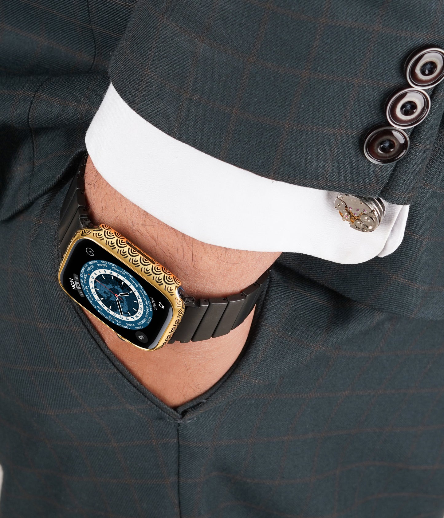 Apple Watch Series 9 golden case with custom design made from sterling silver with a PVD-coated gold finish, featuring hand-applied black enamel for a sleek and sophisticated design