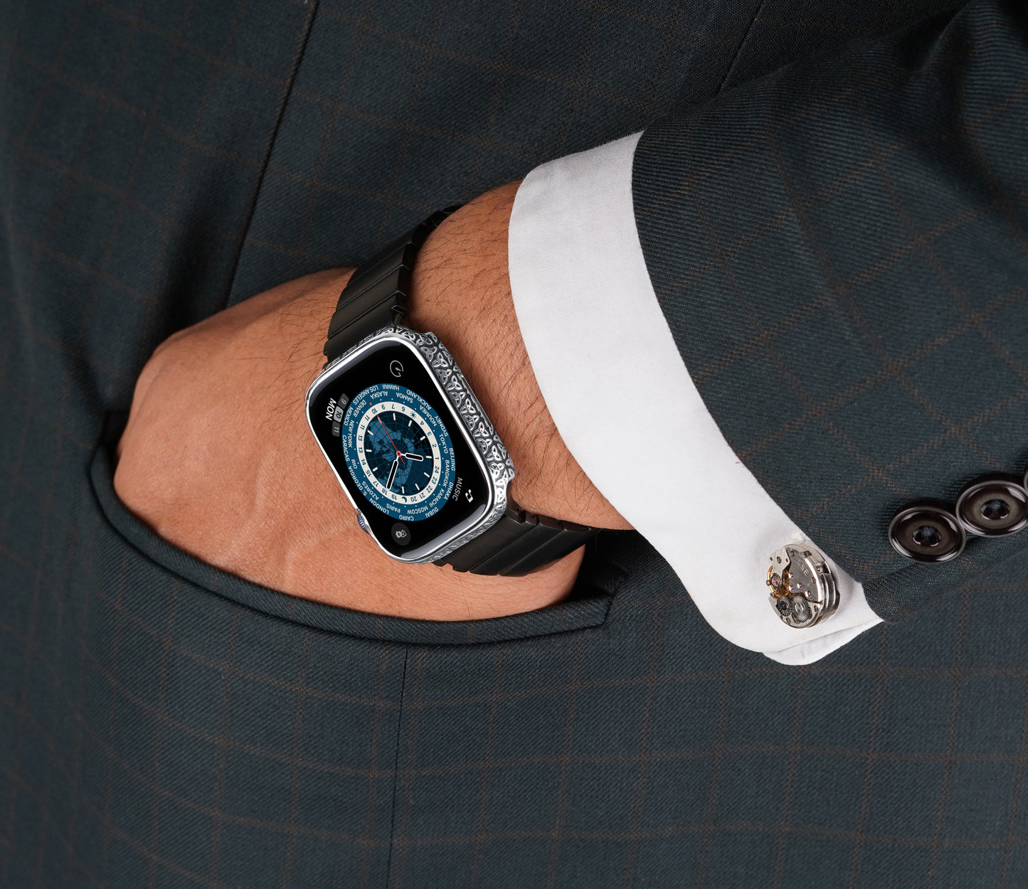 Apple Watch Series 9 silver case with custom design made from sterling silver with a PVD-coated silver finish, featuring hand-applied black enamel for a sleek and sophisticated design