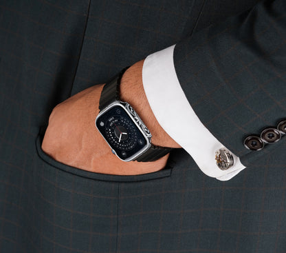 Apple Watch Series 9 silver case with custom design made from sterling silver with a PVD-coated silver finish, featuring hand-applied black enamel for a sleek and sophisticated design