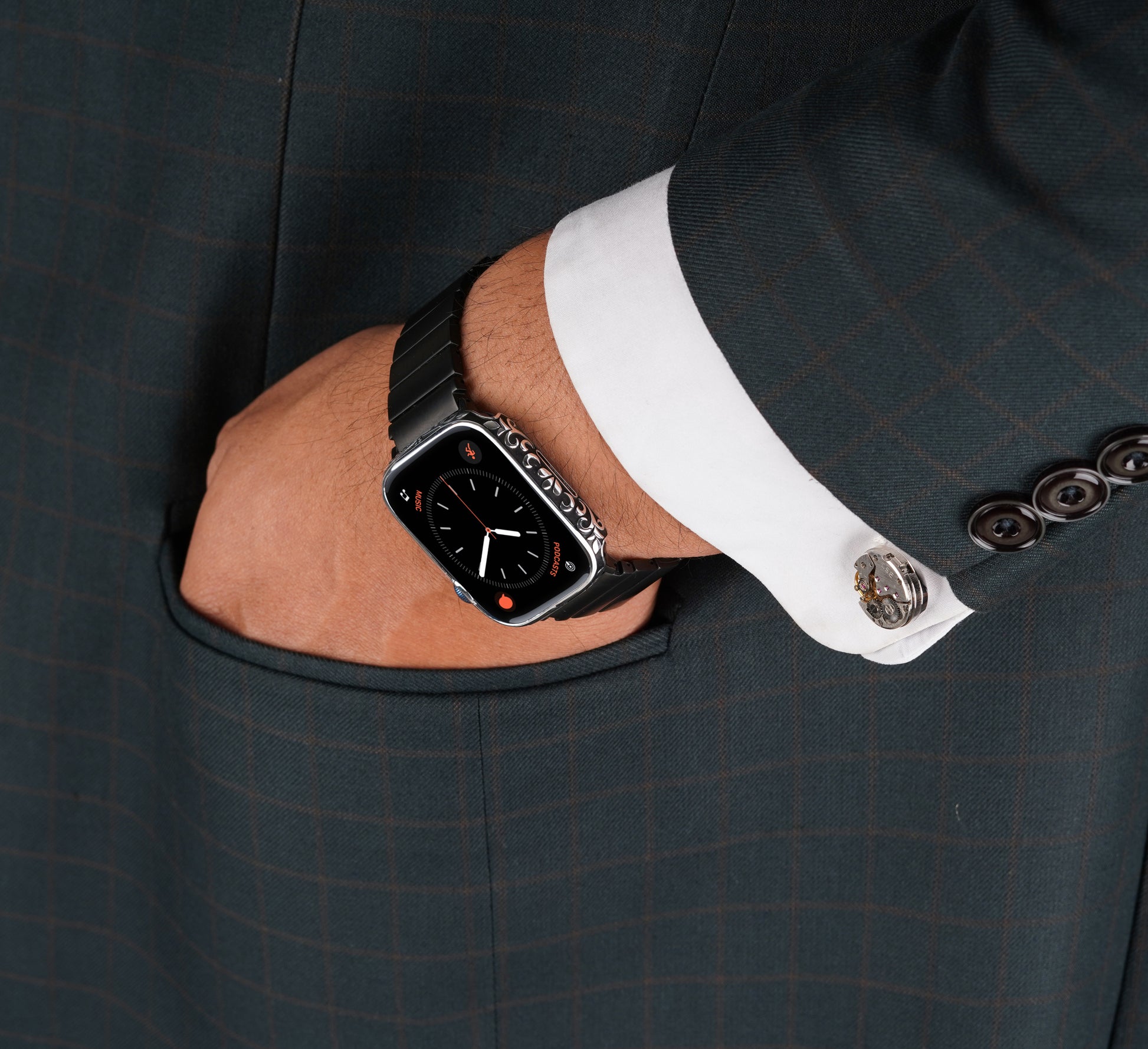 Apple Watch Series 9 silver case with custom design made from sterling silver with a PVD-coated silver finish, featuring hand-applied black enamel for a sleek and sophisticated design