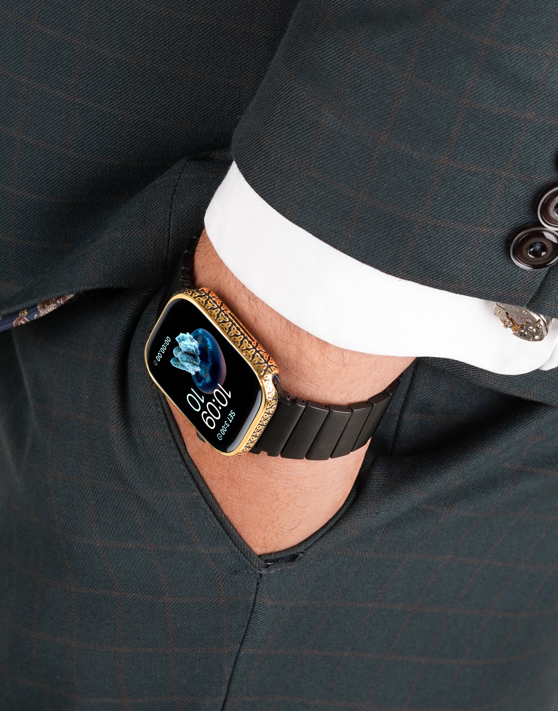 Apple Watch Series 9 silver case with custom design made from sterling silver with a PVD-coated gold finish, featuring hand-applied black enamel for a sleek and sophisticated design